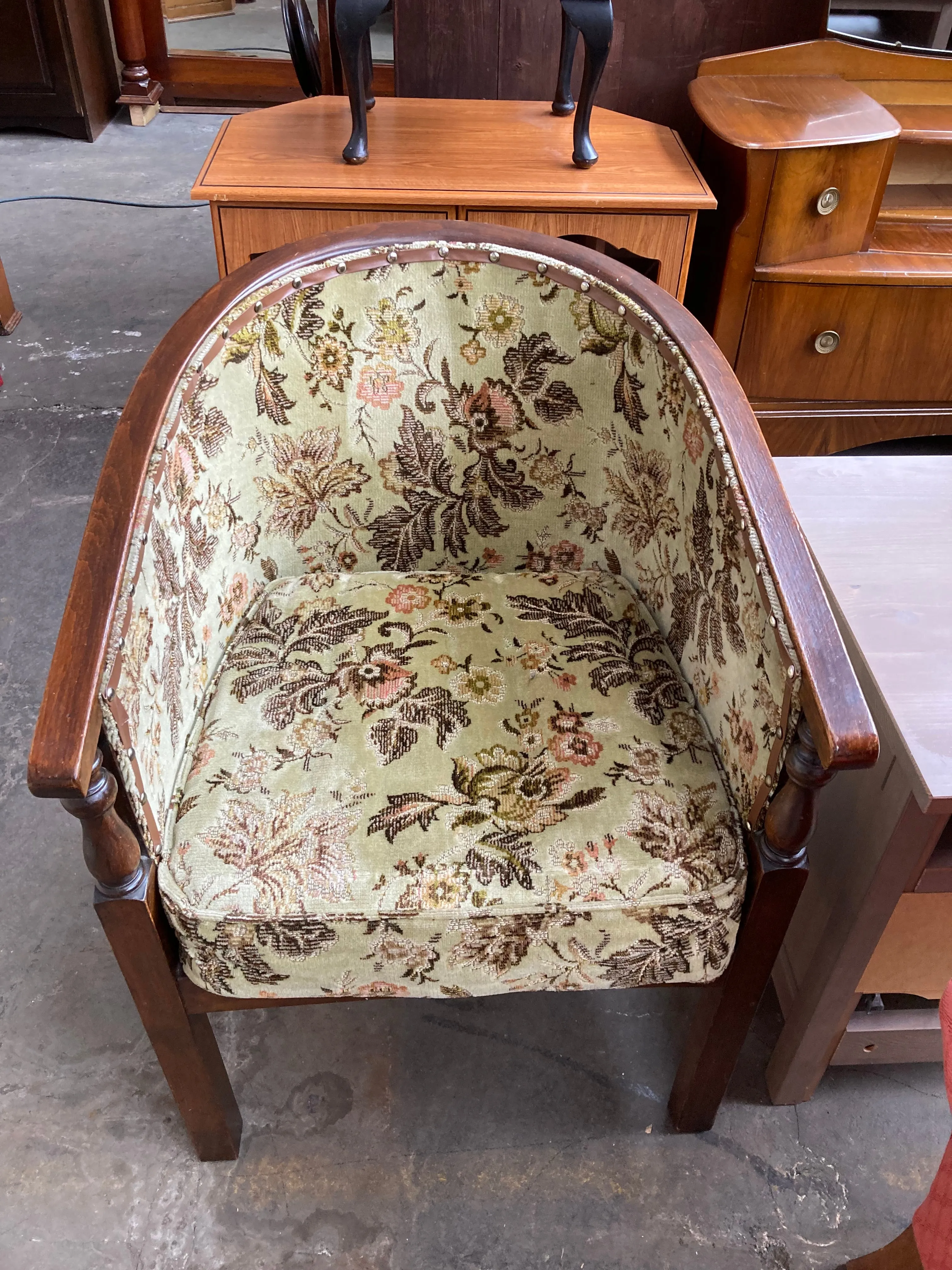 Vintage studded tub chair with floral fabric